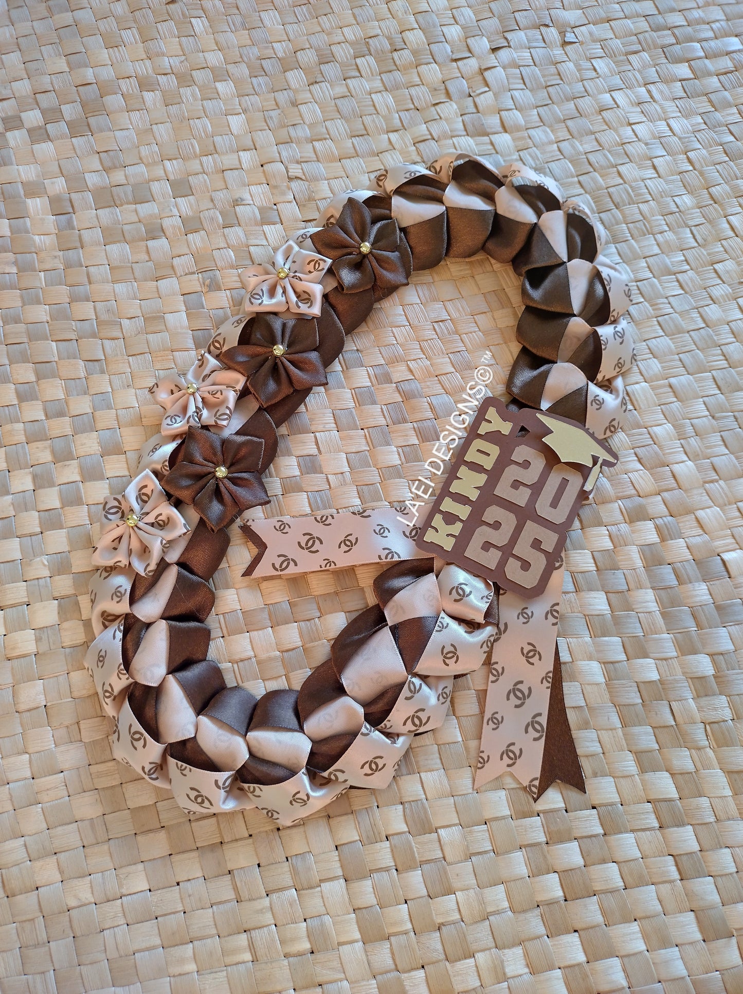 INSPIRED Decorated Single Braid Lei W/ Kindy Badge